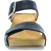 imageDansko Tanya SlipOn Wedge Sandal for Women  Cushioned Contoured Footbed for AllDay Comfort and Support  Hook ampamp Loop Strap with Buckle Detail  Lightweight Rubber OutsoleBlack