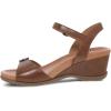 imageDansko Arielle Wedge Sandal for Women  Cushioned Contoured Footbed for AllDay Comfort and Support  Adjustable Hook ampamp Loop Strap with Buckle Detail  Lightweight Rubber OutsoleTan